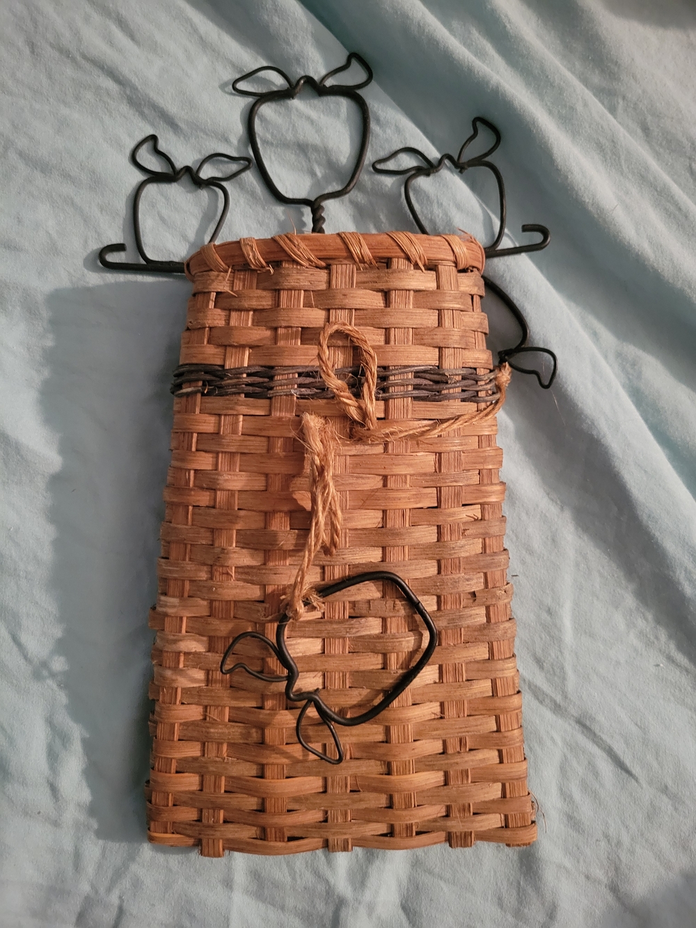 Rustic Black Metal Apple Wall Hook with Woven Basket Accent